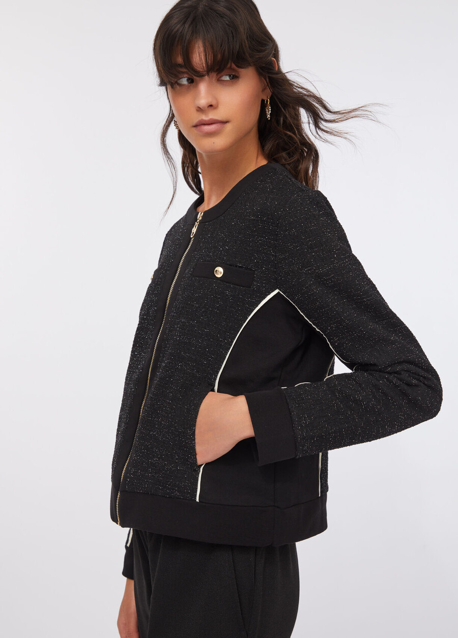 fleece- och boucléjacka